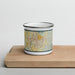 Front View Custom Bloomington Indiana Map Enamel Mug in Woodblock on Cutting Board