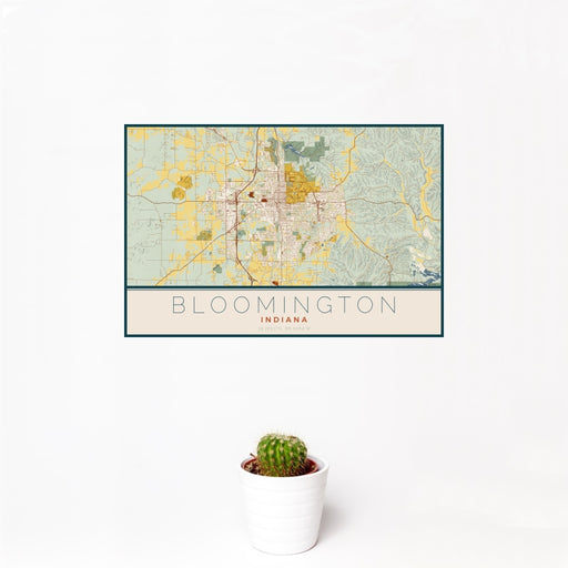 12x18 Bloomington Indiana Map Print Landscape Orientation in Woodblock Style With Small Cactus Plant in White Planter