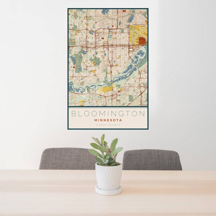 24x36 Bloomington Minnesota Map Print Portrait Orientation in Woodblock Style Behind 2 Chairs Table and Potted Plant