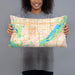 Person holding 20x12 Custom Bloomington Minnesota Map Throw Pillow in Watercolor