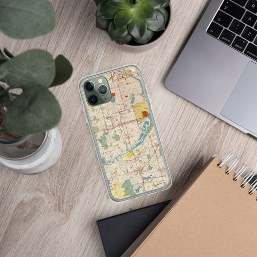 Custom Bloomington Minnesota Map Phone Case in Woodblock on Table with Laptop and Plant