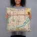Person holding 18x18 Custom Bloomington Minnesota Map Throw Pillow in Woodblock