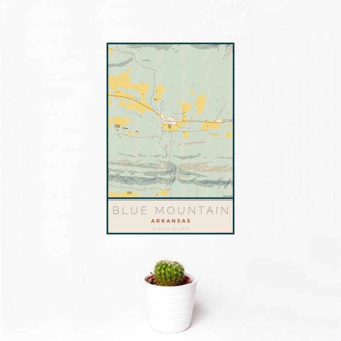 12x18 Blue Mountain Arkansas Map Print Portrait Orientation in Woodblock Style With Small Cactus Plant in White Planter