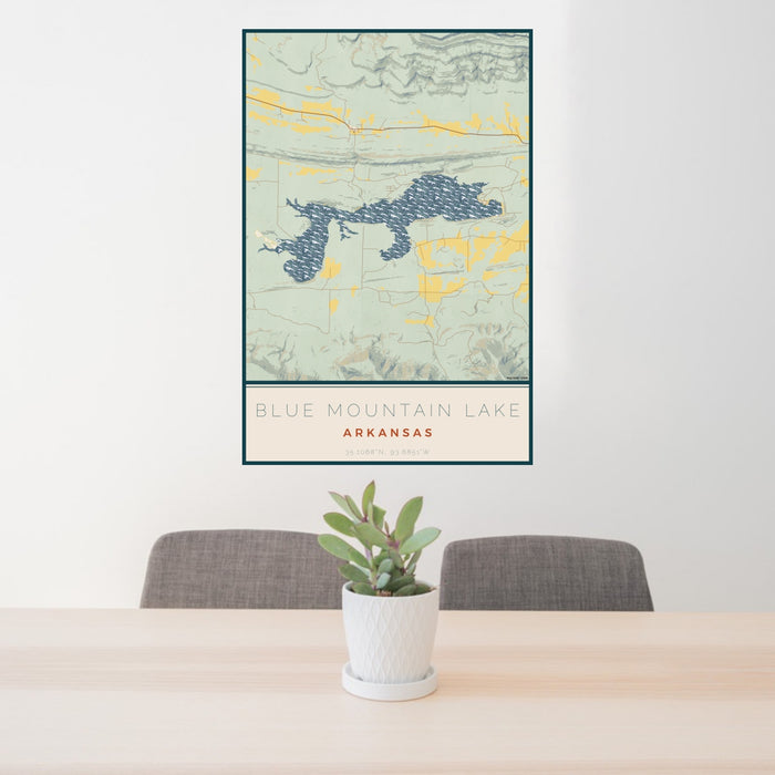 24x36 Blue Mountain Lake Arkansas Map Print Portrait Orientation in Woodblock Style Behind 2 Chairs Table and Potted Plant