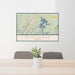 24x36 Blue Ridge Georgia Map Print Lanscape Orientation in Woodblock Style Behind 2 Chairs Table and Potted Plant