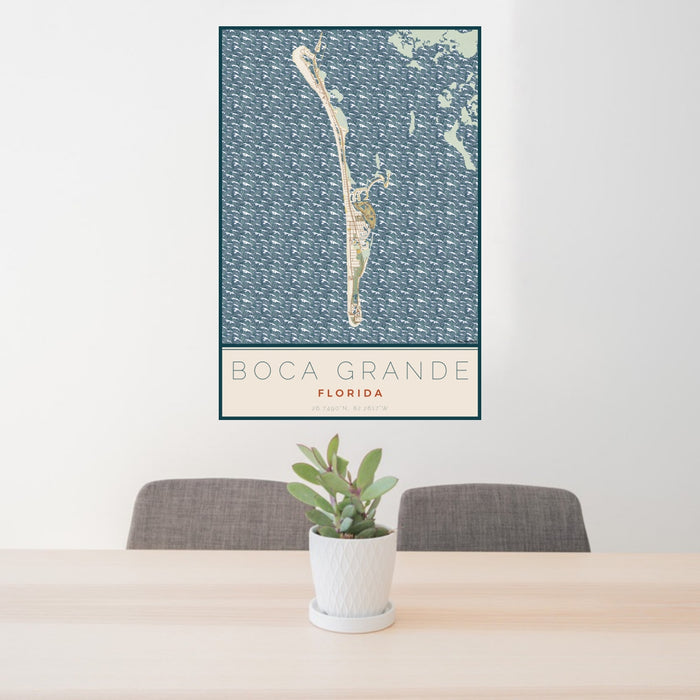 24x36 Boca Grande Florida Map Print Portrait Orientation in Woodblock Style Behind 2 Chairs Table and Potted Plant