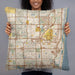 Person holding 22x22 Custom Boca Raton Florida Map Throw Pillow in Woodblock