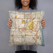 Person holding 18x18 Custom Boca Raton Florida Map Throw Pillow in Woodblock