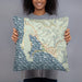 Person holding 18x18 Custom Bodega Bay California Map Throw Pillow in Woodblock