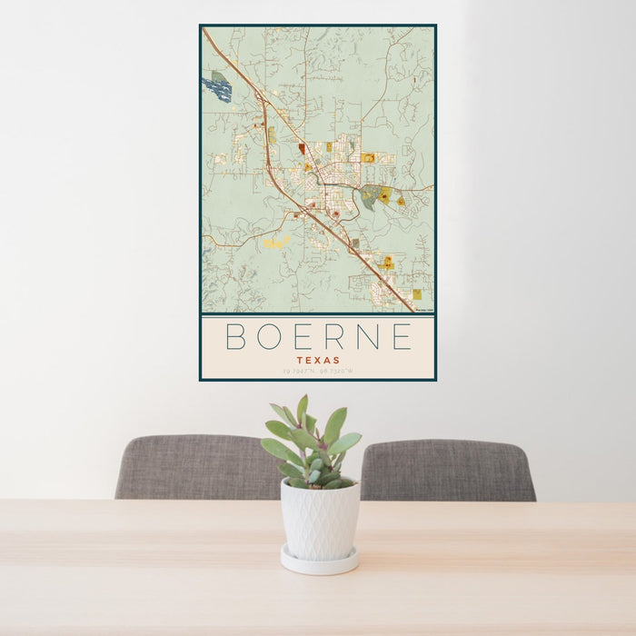 24x36 Boerne Texas Map Print Portrait Orientation in Woodblock Style Behind 2 Chairs Table and Potted Plant