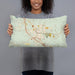 Person holding 20x12 Custom Boerne Texas Map Throw Pillow in Woodblock
