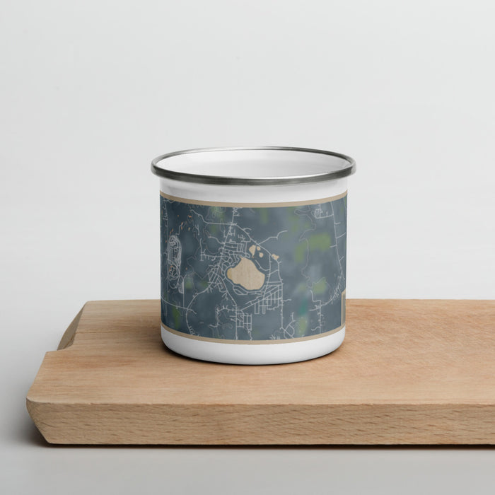 Front View Custom Bohners Lake Wisconsin Map Enamel Mug in Afternoon on Cutting Board