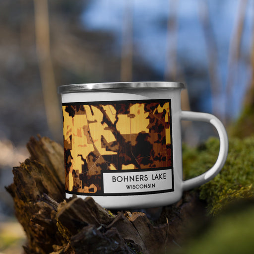 Right View Custom Bohners Lake Wisconsin Map Enamel Mug in Ember on Grass With Trees in Background