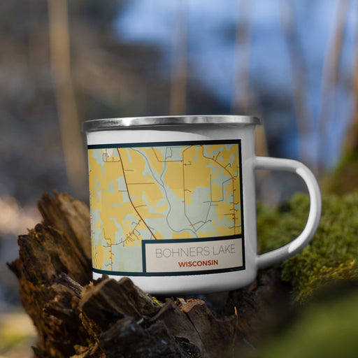 Right View Custom Bohners Lake Wisconsin Map Enamel Mug in Woodblock on Grass With Trees in Background