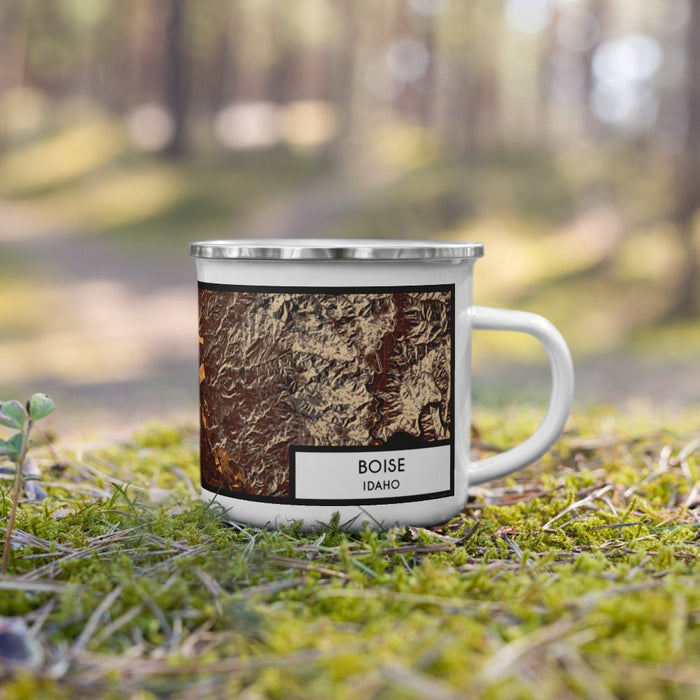 Right View Custom Boise Idaho Map Enamel Mug in Ember on Grass With Trees in Background