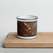 Front View Custom Boise Idaho Map Enamel Mug in Ember on Cutting Board