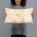 Person holding 20x12 Custom Boise Idaho Map Throw Pillow in Watercolor