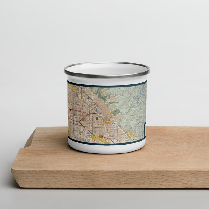 Front View Custom Boise Idaho Map Enamel Mug in Woodblock on Cutting Board