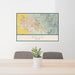 24x36 Boise Idaho Map Print Landscape Orientation in Woodblock Style Behind 2 Chairs Table and Potted Plant