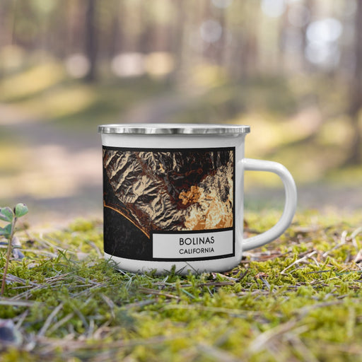 Right View Custom Bolinas California Map Enamel Mug in Ember on Grass With Trees in Background