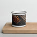 Front View Custom Bolinas California Map Enamel Mug in Ember on Cutting Board