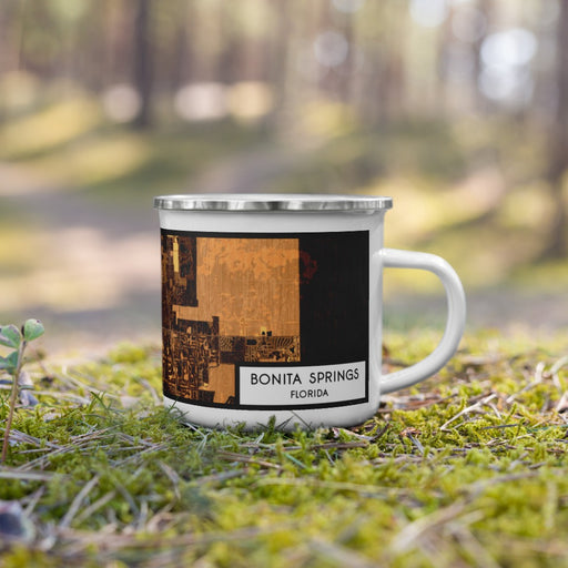 Right View Custom Bonita Springs Florida Map Enamel Mug in Ember on Grass With Trees in Background
