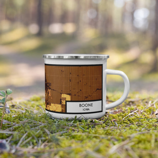 Right View Custom Boone Iowa Map Enamel Mug in Ember on Grass With Trees in Background