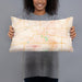 Person holding 20x12 Custom Boone Iowa Map Throw Pillow in Watercolor