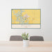 24x36 Boone Iowa Map Print Landscape Orientation in Woodblock Style Behind 2 Chairs Table and Potted Plant