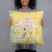 Person holding 18x18 Custom Boone Iowa Map Throw Pillow in Woodblock