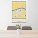 24x36 Boonville Missouri Map Print Portrait Orientation in Woodblock Style Behind 2 Chairs Table and Potted Plant