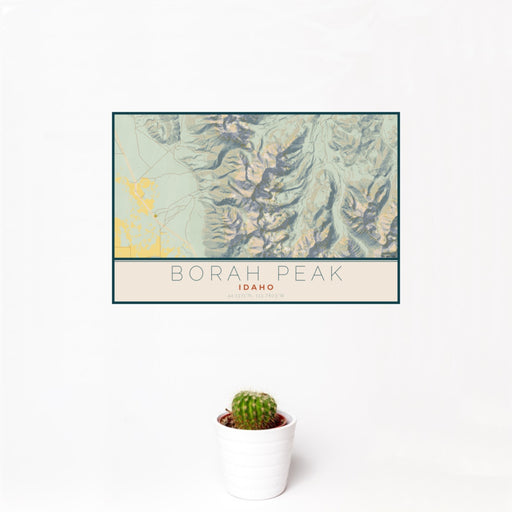 12x18 Borah Peak Idaho Map Print Landscape Orientation in Woodblock Style With Small Cactus Plant in White Planter