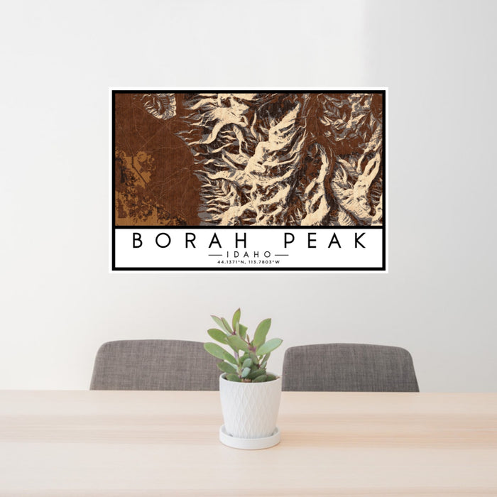 24x36 Borah Peak Idaho Map Print Lanscape Orientation in Ember Style Behind 2 Chairs Table and Potted Plant