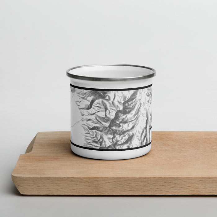Front View Custom Borah Peak Idaho Map Enamel Mug in Classic on Cutting Board
