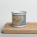 Front View Custom Boston Massachusetts Map Enamel Mug in Woodblock on Cutting Board