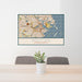 24x36 Boston Massachusetts Map Print Landscape Orientation in Woodblock Style Behind 2 Chairs Table and Potted Plant