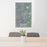 24x36 Boulder Colorado Map Print Portrait Orientation in Afternoon Style Behind 2 Chairs Table and Potted Plant