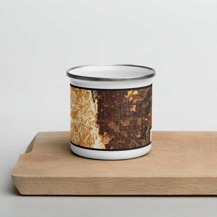 Front View Custom Boulder Colorado Map Enamel Mug in Ember on Cutting Board