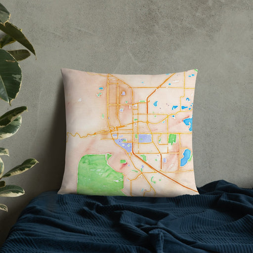 Custom Boulder Colorado Map Throw Pillow in Watercolor on Bedding Against Wall
