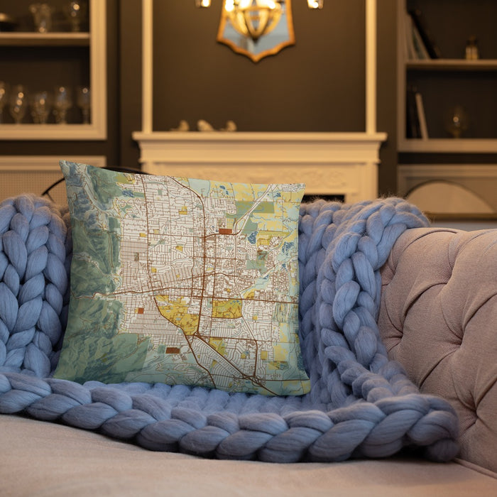 Custom Boulder Colorado Map Throw Pillow in Woodblock on Cream Colored Couch