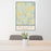 24x36 Bovina New York Map Print Portrait Orientation in Woodblock Style Behind 2 Chairs Table and Potted Plant