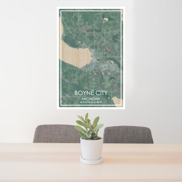 24x36 Boyne City Michigan Map Print Portrait Orientation in Afternoon Style Behind 2 Chairs Table and Potted Plant