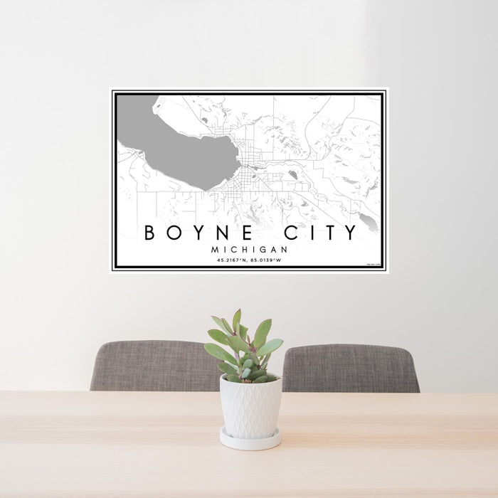 24x36 Boyne City Michigan Map Print Landscape Orientation in Classic Style Behind 2 Chairs Table and Potted Plant