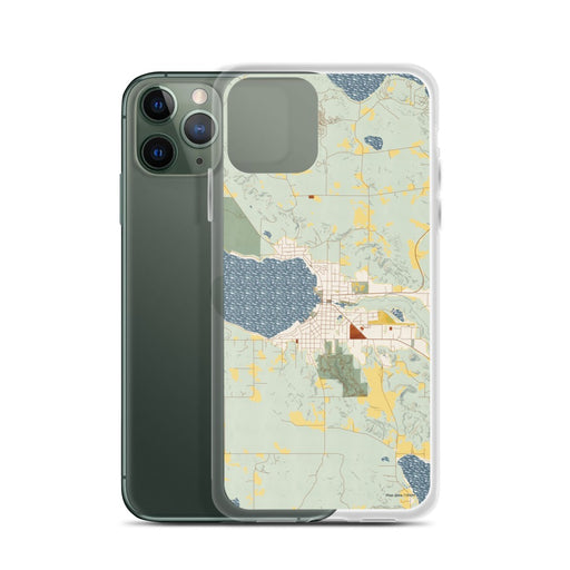 Custom Boyne City Michigan Map Phone Case in Woodblock on Table with Laptop and Plant