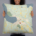 Person holding 22x22 Custom Boyne City Michigan Map Throw Pillow in Woodblock