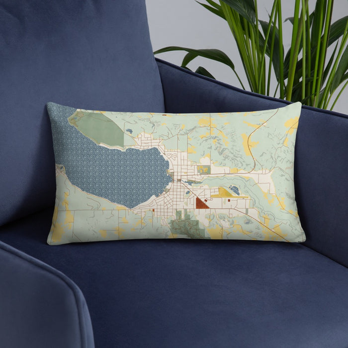 Custom Boyne City Michigan Map Throw Pillow in Woodblock on Blue Colored Chair