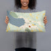 Person holding 20x12 Custom Boyne City Michigan Map Throw Pillow in Woodblock