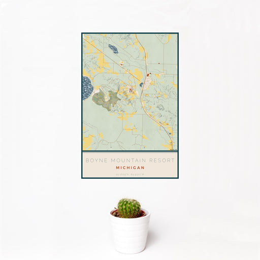 12x18 Boyne Mountain Resort Michigan Map Print Portrait Orientation in Woodblock Style With Small Cactus Plant in White Planter