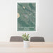 24x36 Boyne Mountain Resort Michigan Map Print Portrait Orientation in Afternoon Style Behind 2 Chairs Table and Potted Plant