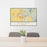 24x36 Bozeman Montana Map Print Landscape Orientation in Woodblock Style Behind 2 Chairs Table and Potted Plant